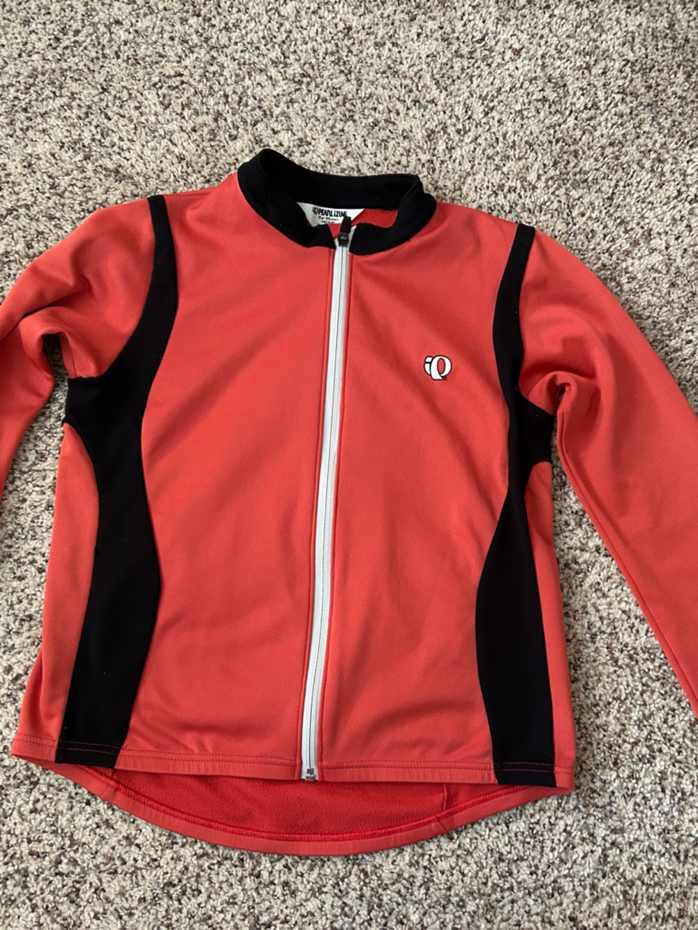 Pearl Izumi women’s Coral Red and Black long sleeve thermal cycling top